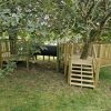 Timber tree play platforms linked by a crawl tunnel
