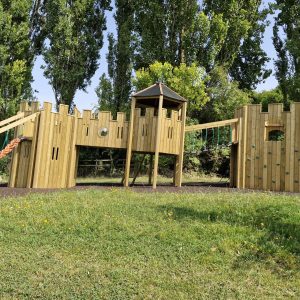 King Edward's School multi adventure play structure with linked timber towers and slide
