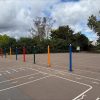 Landscaping and decorative coloured pencil posts close view