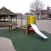 Finished Oval Activity Trail play area with green safety surfacing