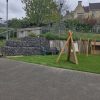 Stroud Valley natural play pieces and shelter view