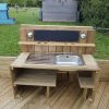 Bespoke timber mud kitchen with bowls and chalkboard